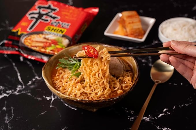Nongshim Shin Ramyun Noodles, Spicy Korean Signature Instant Ramyun, Rich Beef Flavored Broth, Microwaveable, Korean Instant Noodles, 4.23 oz (Pack of 16), Packaging May Vary
