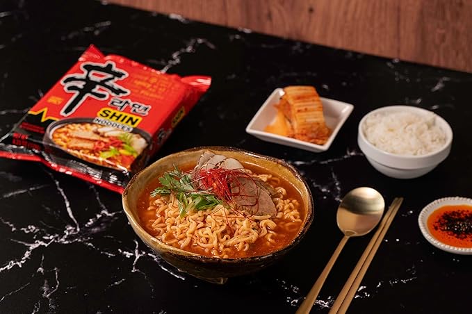 Nongshim Shin Ramyun Noodles, Spicy Korean Signature Instant Ramyun, Rich Beef Flavored Broth, Microwaveable, Korean Instant Noodles, 4.23 oz (Pack of 16), Packaging May Vary